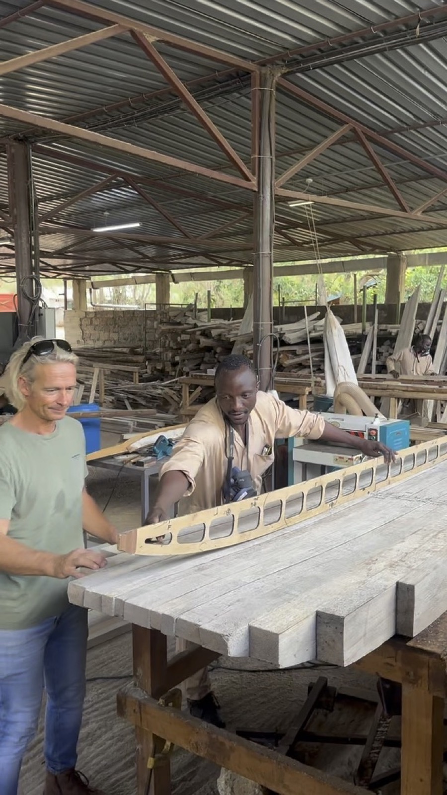 Builders shaping an Agave 10 core in the workshop, combining CNC technology with hand-crafting